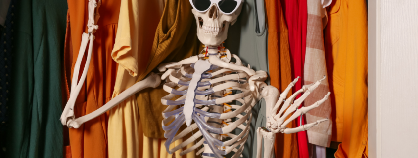 Skeleton with sunglasses in closet