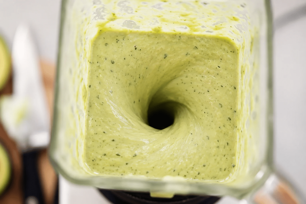 Avocado dressing ingredients in a blender