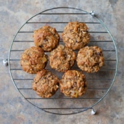 Freshly baked bran muffins cooling on a rack
