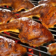 A close up of food on a grill, with Chicken