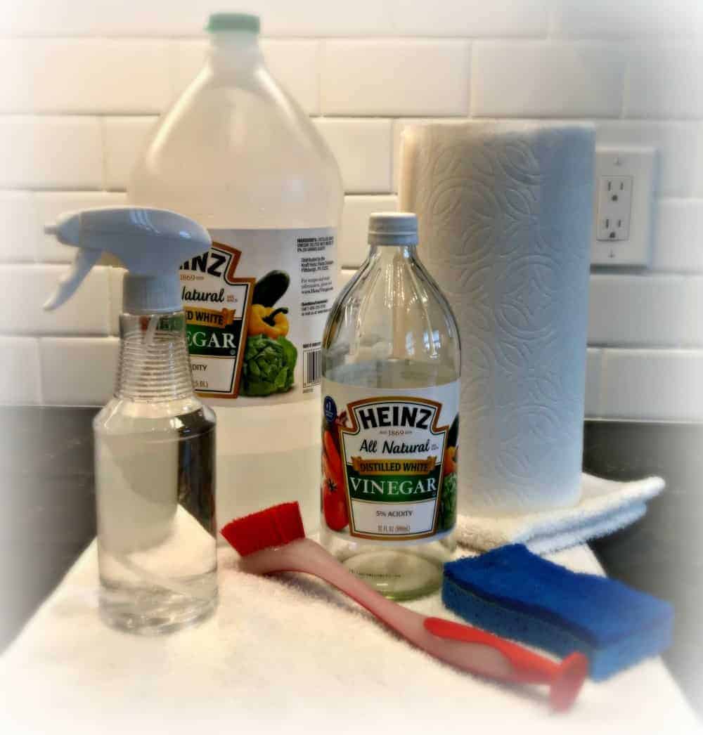 A bottle of plain white vinegar on the counter