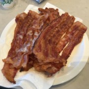 A plate of food, with Bacon