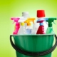 spray bottles in a bucket filled with cleaners you can make yourself that better than store bought and lots cheaper too