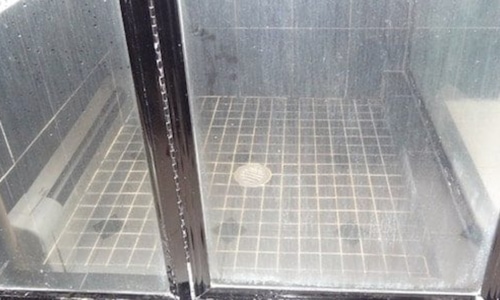 A glass door, with Hard water