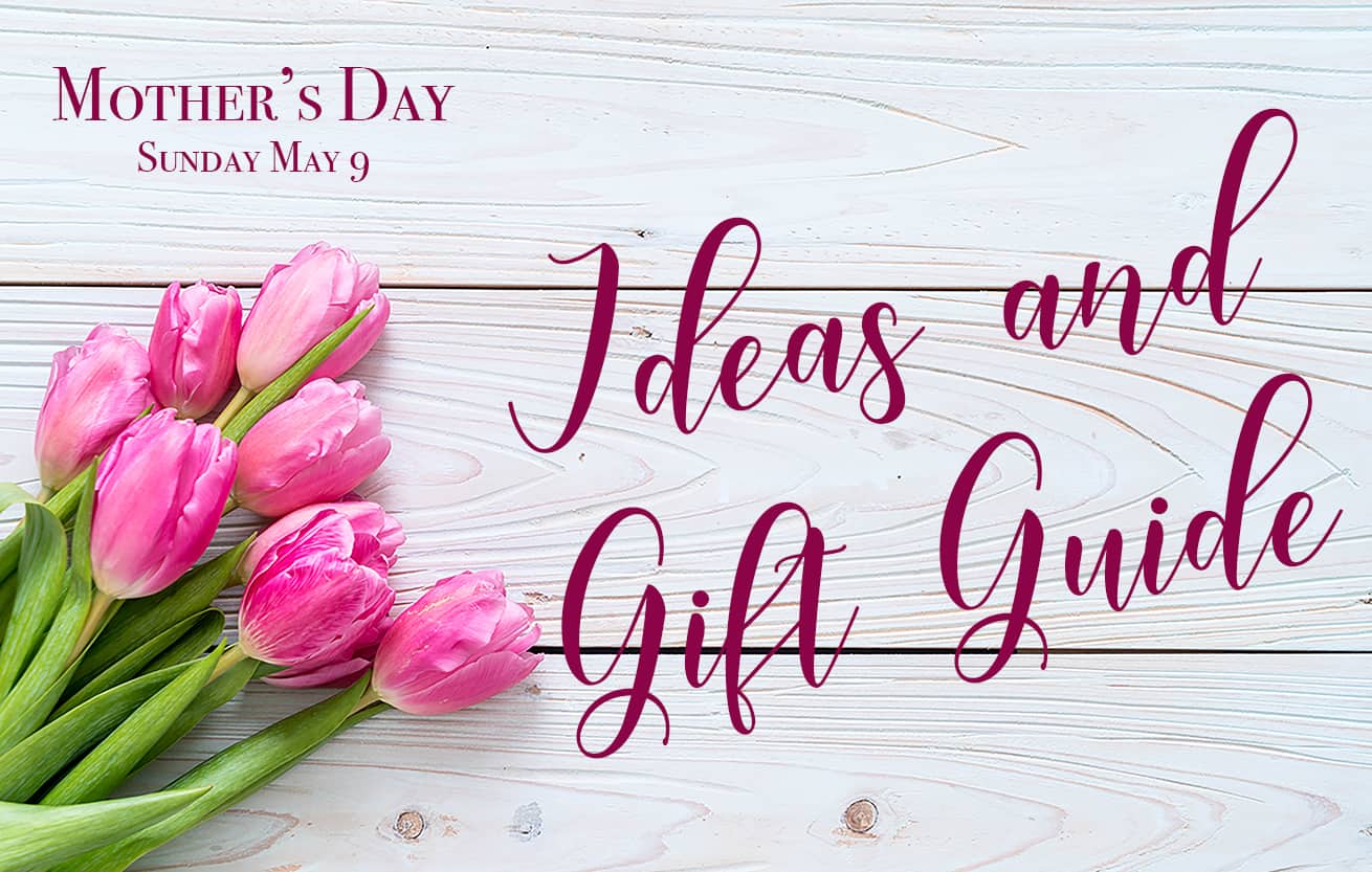 pink tulip flower on wood background with copy Mother's Day Gift guide 2021