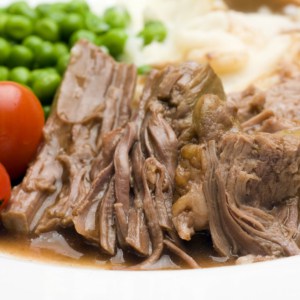 A close up of a plate of food, with Pot roast