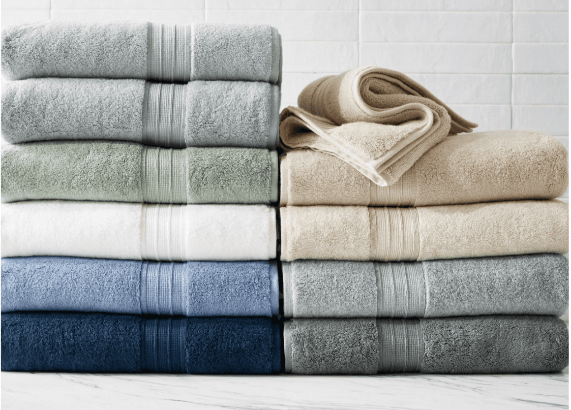 Bath towels in multiple colors folded in a stack
