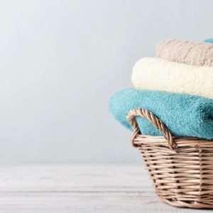 beautiful laundry basked filled with best inexpensive bath towels of multible volors available in 2022