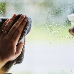 cleaning window with spray