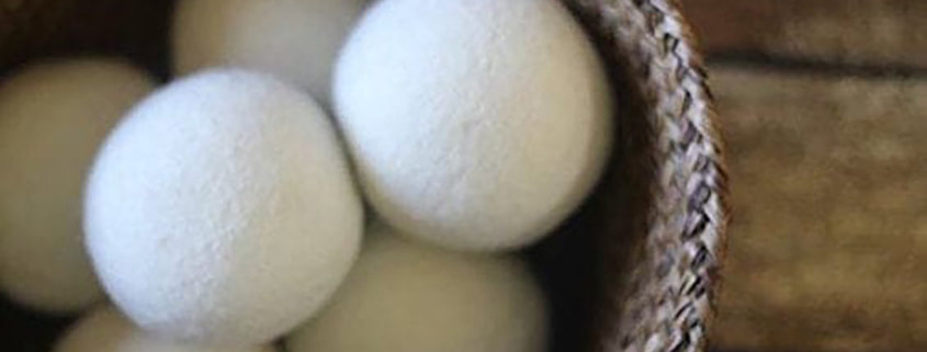 wool dryer balls in a basket