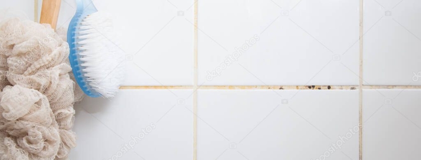 shower grout that needs cleaning