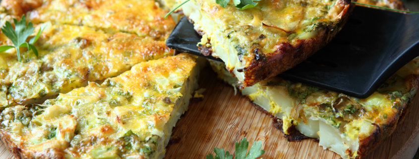 Italian Frittata with slices of fresh greens, food