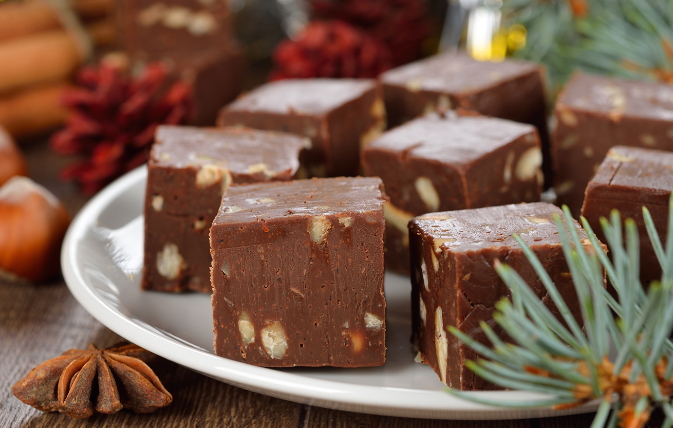 traditional Christmas chocolate fudge, close-up on a brown 