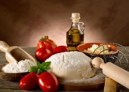 ingredients on a table for homemade pizza with no-rise dough