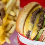 In-n-Out Burger with fries in the background