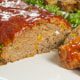 A close up of food on a plate, with Meatloaf