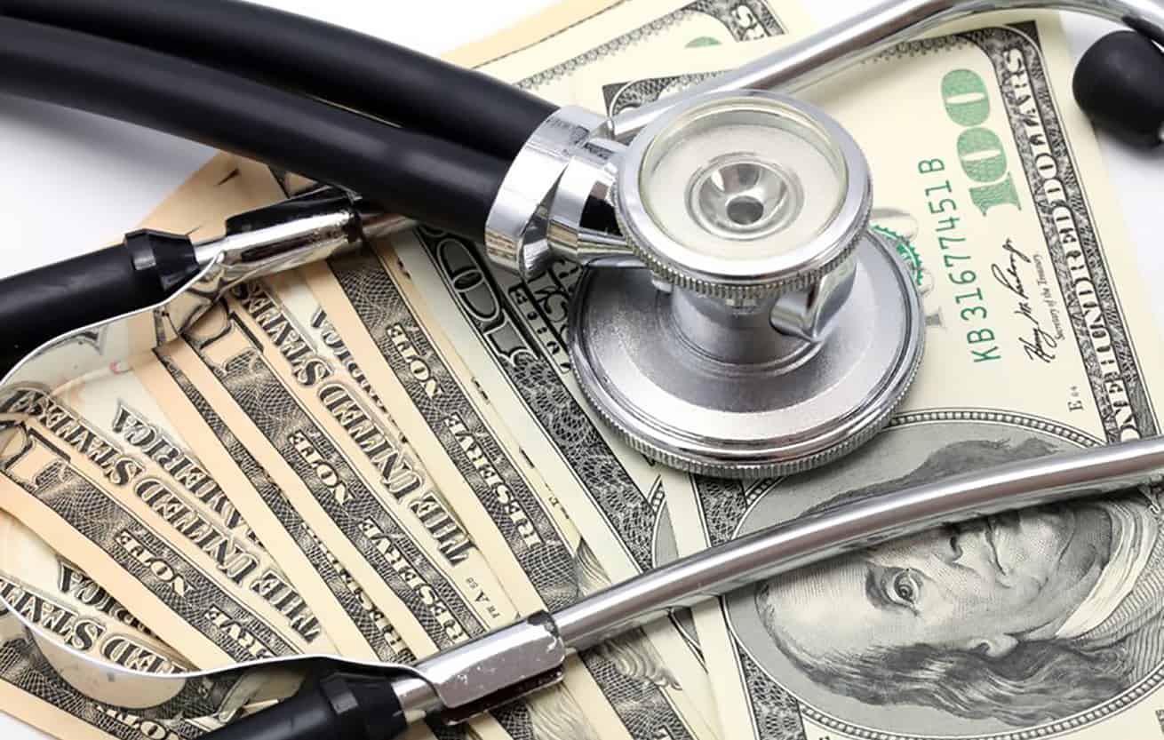 11867031 - stethoscope on money dollar cash currency banknote background using for healthy financial and insurance concept