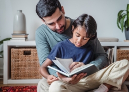 Father daughter reading a book