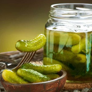 pickles in a jar and a bowl