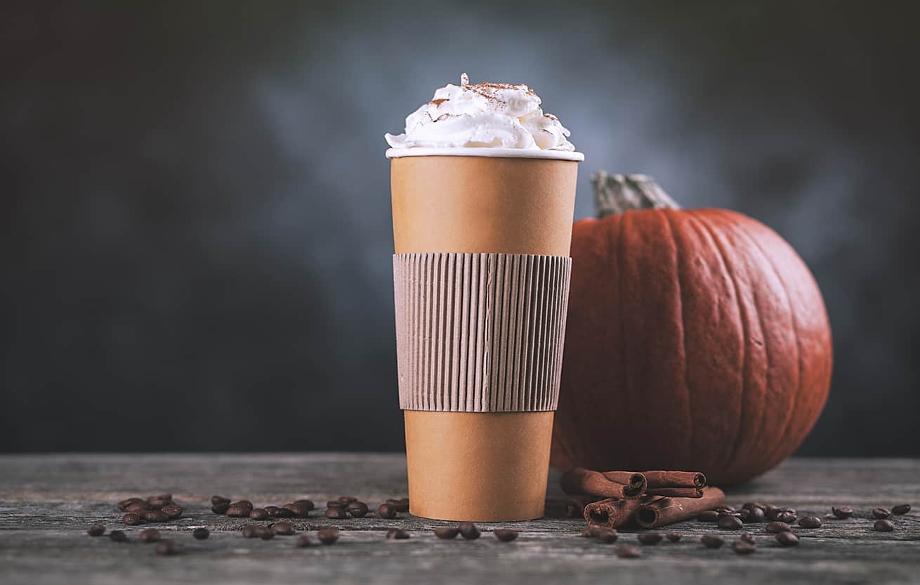large pumpkin spice latte in paper cup