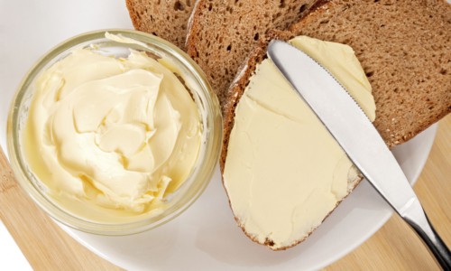 soft spreadable butter on brown bread