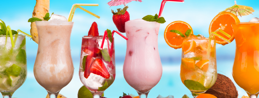 Summer drinks with blur beach on background