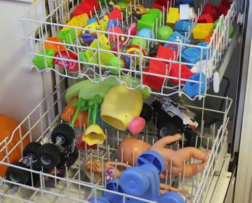 toys getting sanitized and cleaned in the dishwasher