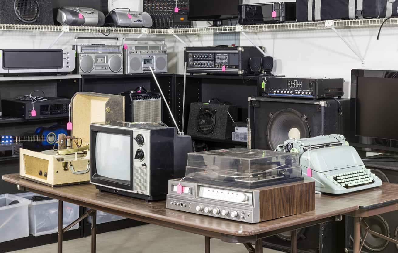 Vintage consumer electronics inside a funky thrift antique store