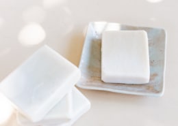 white bar soap with soap dish on white background